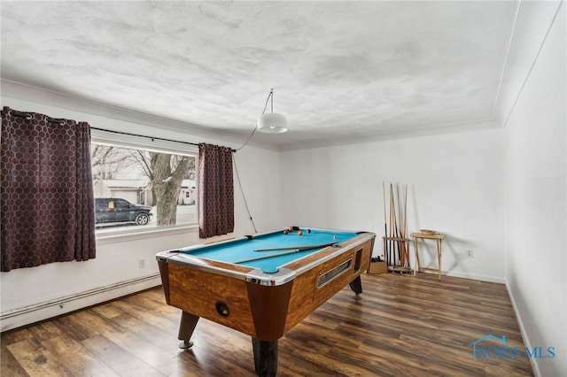 rec room with wood-type flooring, a textured ceiling, a baseboard heating unit, and pool table