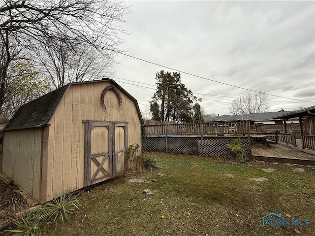 view of outdoor structure with a lawn