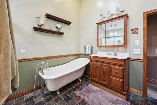 bathroom with vanity and a bathing tub