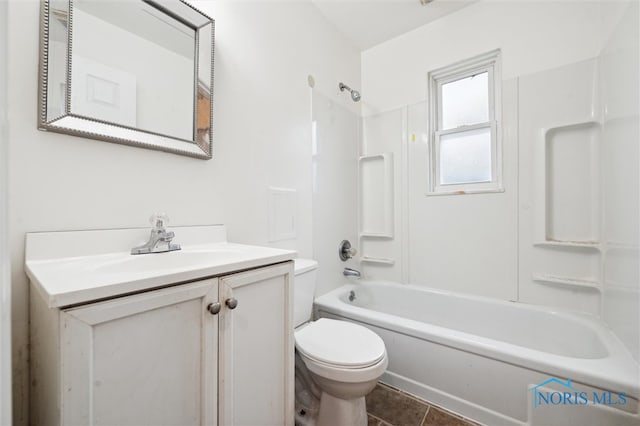 full bathroom with bathing tub / shower combination, tile patterned flooring, vanity, and toilet