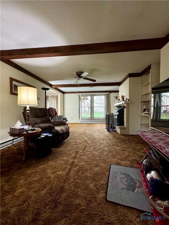 living room featuring carpet flooring, ceiling fan, ornamental molding, and a textured ceiling