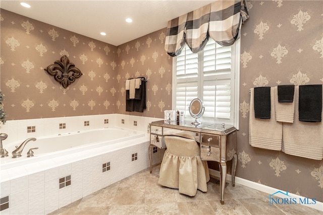 bathroom with tiled bath