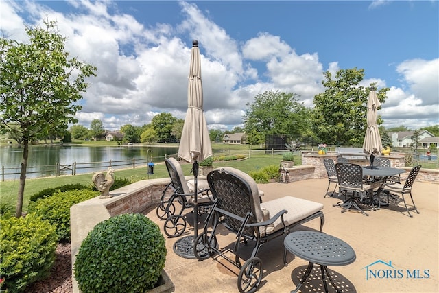 view of patio / terrace featuring a water view