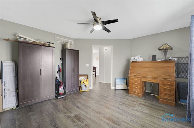 miscellaneous room featuring ceiling fan and wood-type flooring