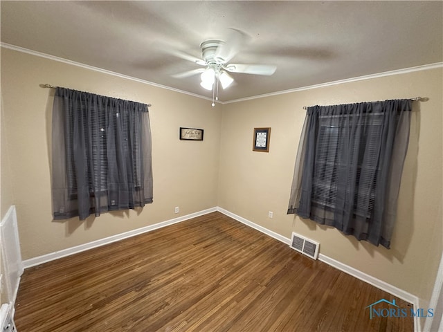 unfurnished room featuring wood-type flooring, ceiling fan, and ornamental molding