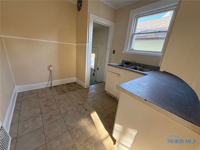 bathroom featuring tile patterned floors and sink