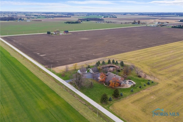 birds eye view of property featuring a rural view