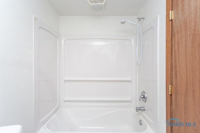 bathroom featuring shower / tub combination