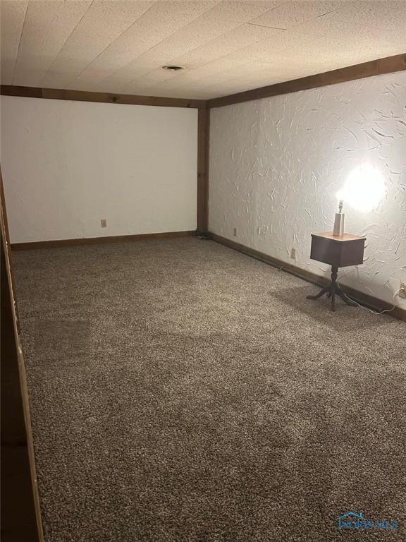 spare room with carpet flooring