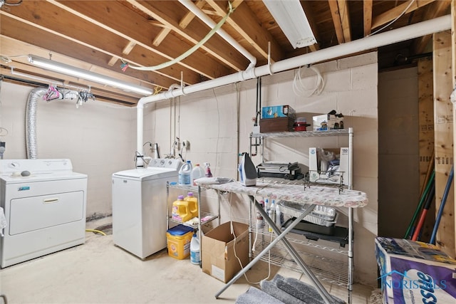 washroom featuring washer and dryer