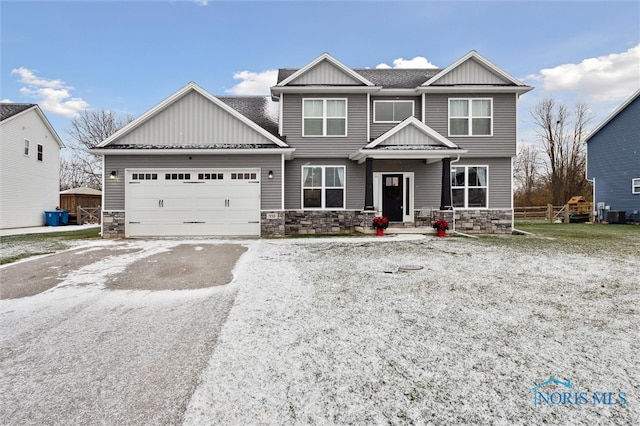 craftsman-style home with a garage