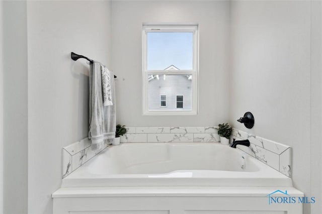 bathroom featuring a tub