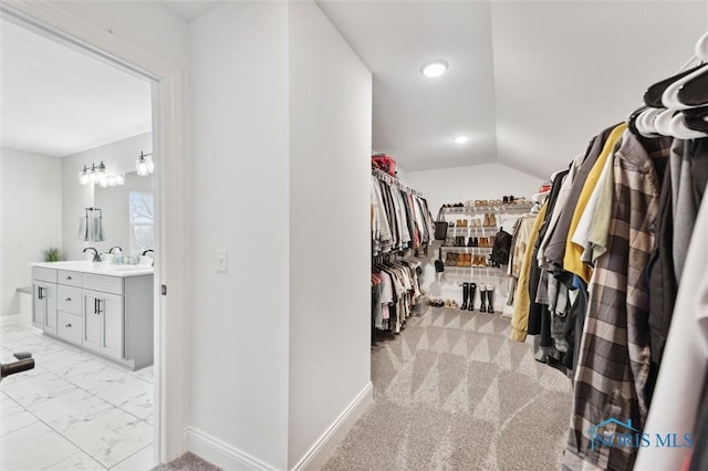 spacious closet with lofted ceiling