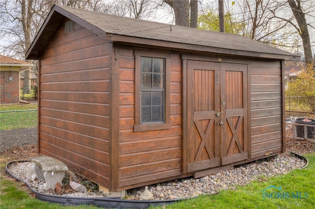 view of outbuilding featuring central air condition unit