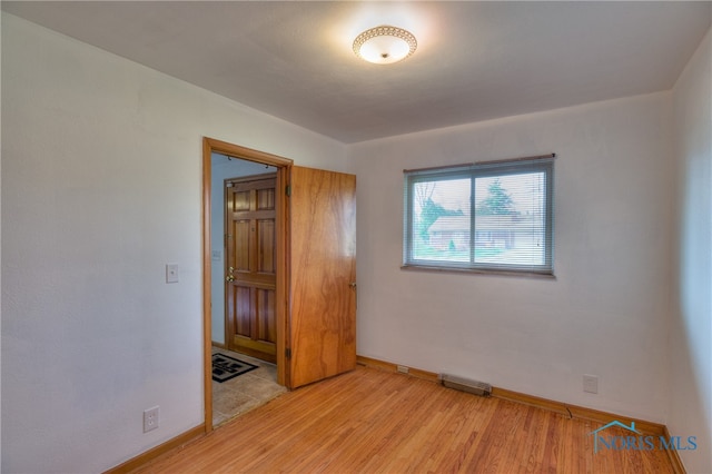 unfurnished bedroom with light hardwood / wood-style flooring