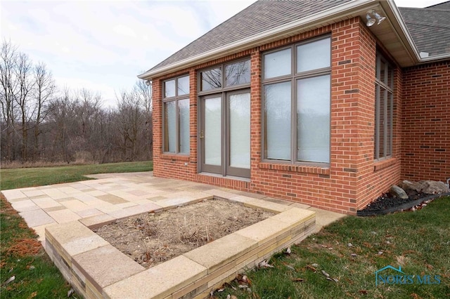 view of home's exterior with a patio