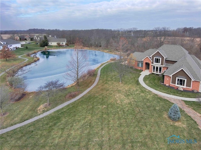 bird's eye view with a water view