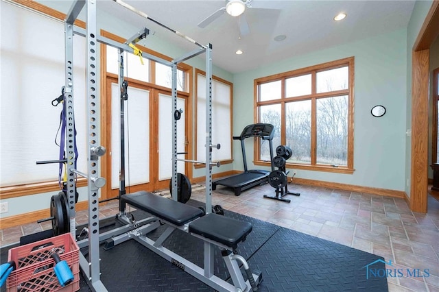 workout area featuring ceiling fan