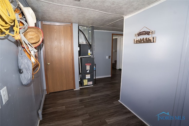 hallway with dark wood-type flooring