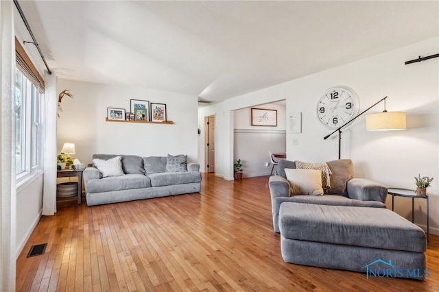 living room with hardwood / wood-style flooring