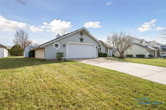 view of front of house featuring a front yard and a garage