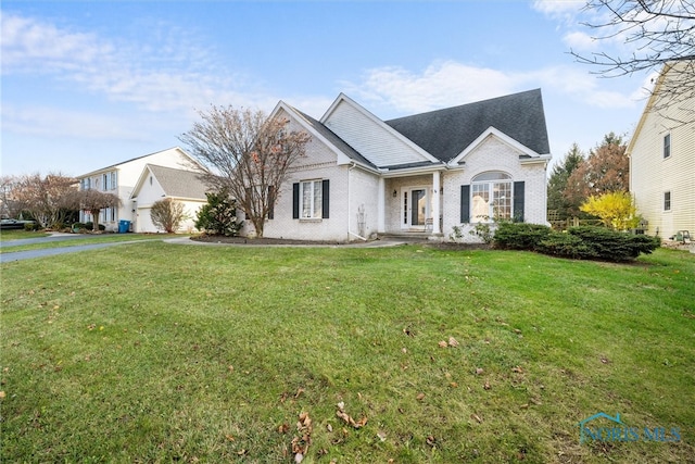 view of front of home with a front yard