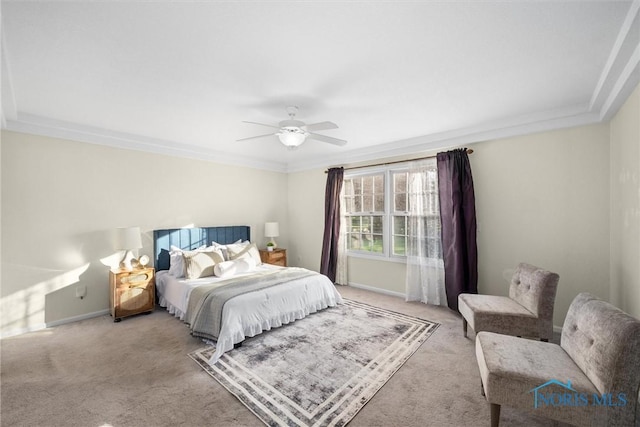 bedroom featuring light colored carpet, ceiling fan, and crown molding