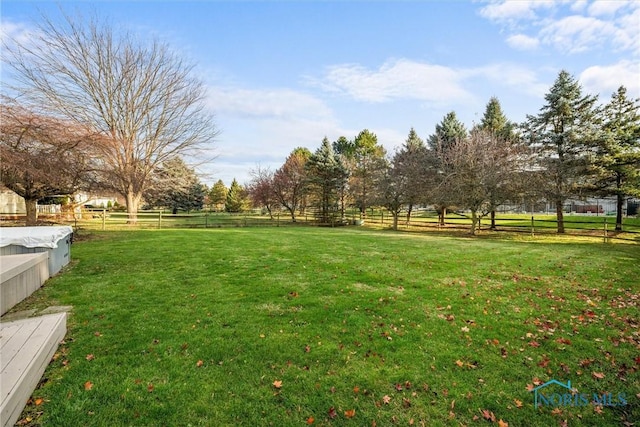 view of yard featuring a rural view