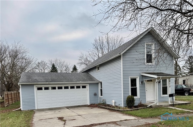 front of property with a garage