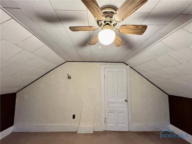 additional living space with ceiling fan and lofted ceiling