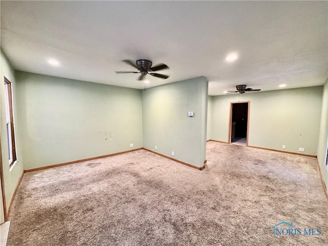 empty room with light carpet and ceiling fan