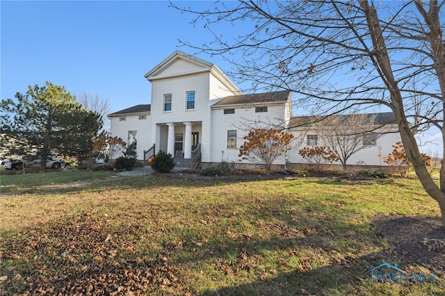 view of front of home with a front yard