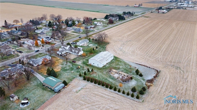 birds eye view of property with a rural view