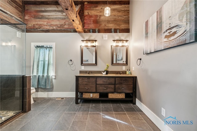 bathroom featuring vanity, beamed ceiling, wooden ceiling, and toilet