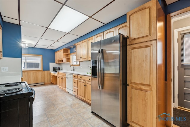 kitchen with dishwasher, black electric range, stainless steel refrigerator with ice dispenser, a baseboard heating unit, and a paneled ceiling