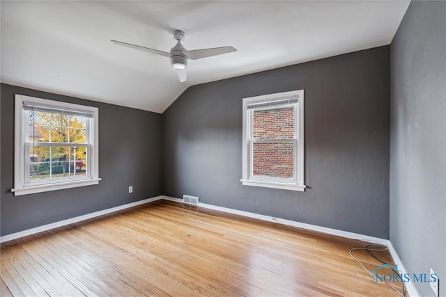 bonus room featuring ceiling fan, lofted ceiling, and light hardwood / wood-style flooring