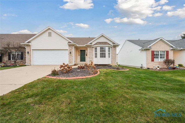 ranch-style home featuring a front lawn and a garage