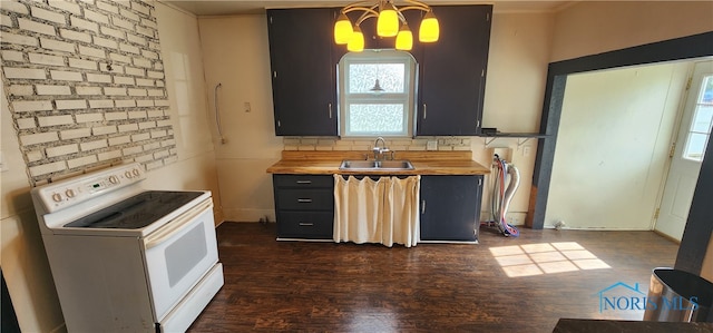 kitchen featuring dark hardwood / wood-style flooring, backsplash, sink, electric range, and butcher block countertops