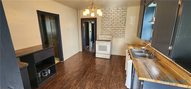 kitchen with white range with electric cooktop, dark wood-type flooring, wooden counters, and decorative light fixtures