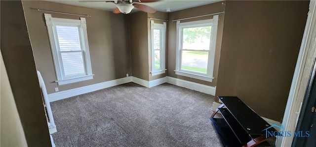 unfurnished room featuring carpet flooring and ceiling fan