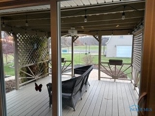 wooden deck with ceiling fan