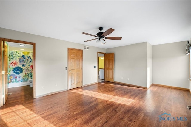 empty room with light wood-type flooring and ceiling fan