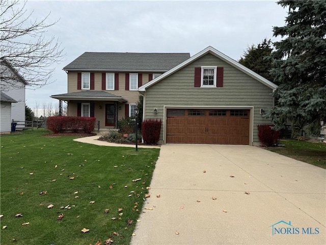 view of front of home featuring a porch, a front yard, and a garage