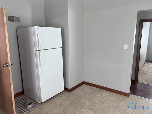 kitchen with white refrigerator