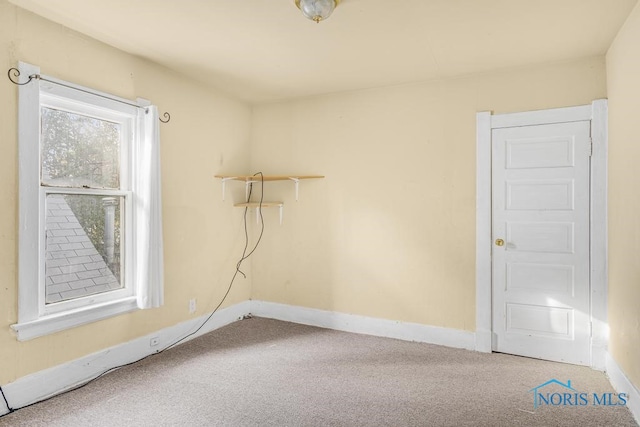 view of carpeted spare room