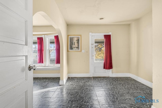 foyer featuring a healthy amount of sunlight