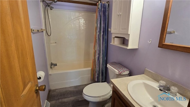 full bathroom featuring vanity, shower / bath combination with curtain, and toilet