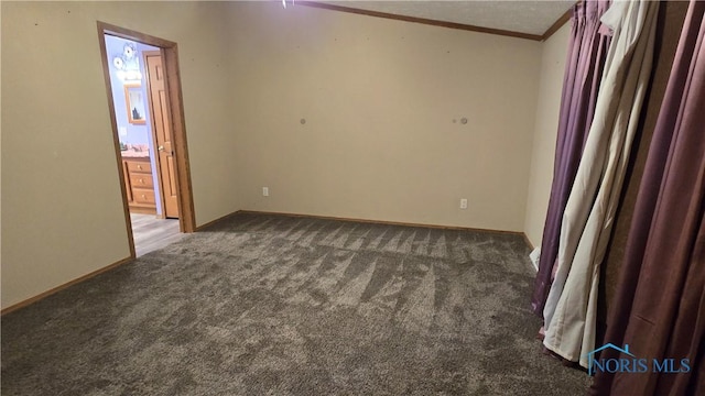 carpeted spare room with ornamental molding