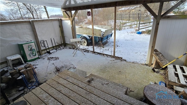 view of snow covered patio