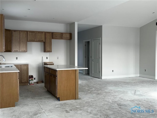 kitchen with a center island and sink